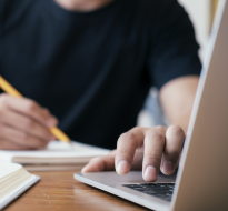 hand on a laptop