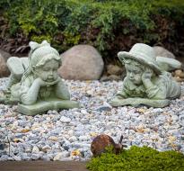 DropnSwapGardenDecor.jpg Two garden decorations of children reading books