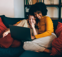 LGBTQmovie.png A couple watching a movie together on the couch
