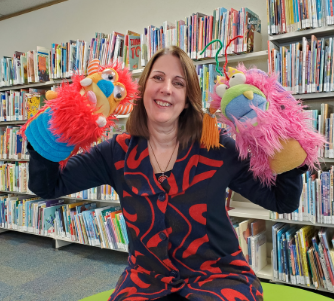Trish with two puppets