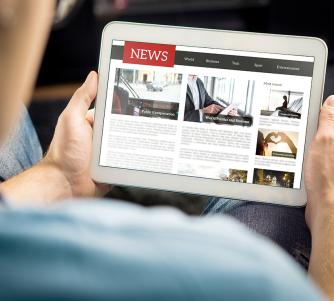 Online Newspaper on tablet