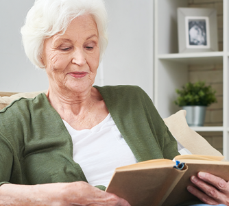 Senior woman reading a book