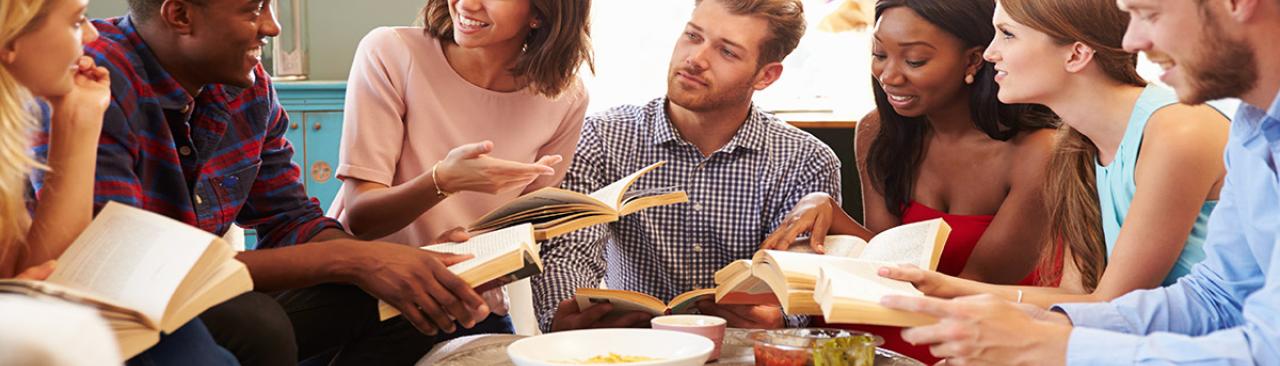 Group reading a book