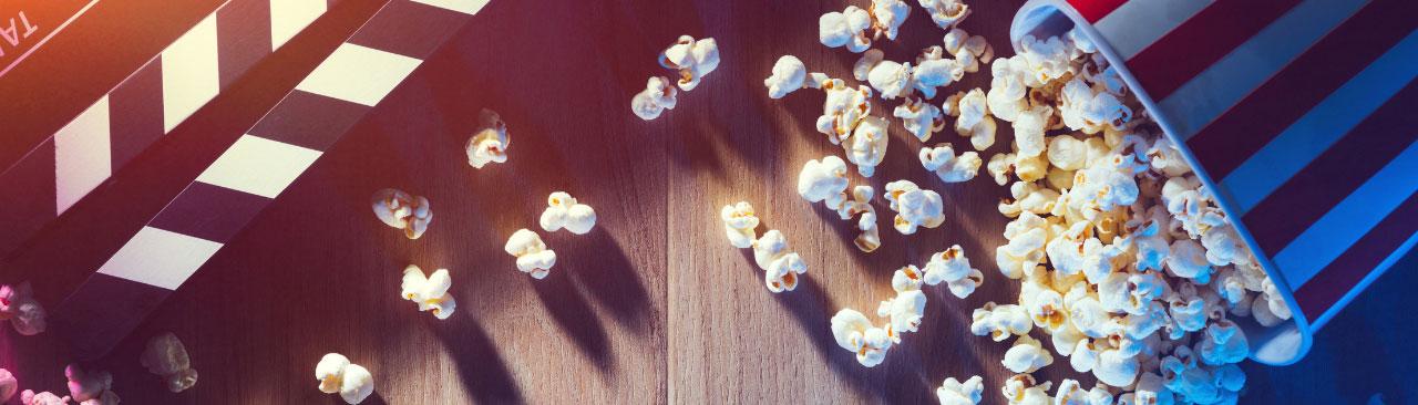family-trivia-night-hero.jpg popcorn and a directors clapper